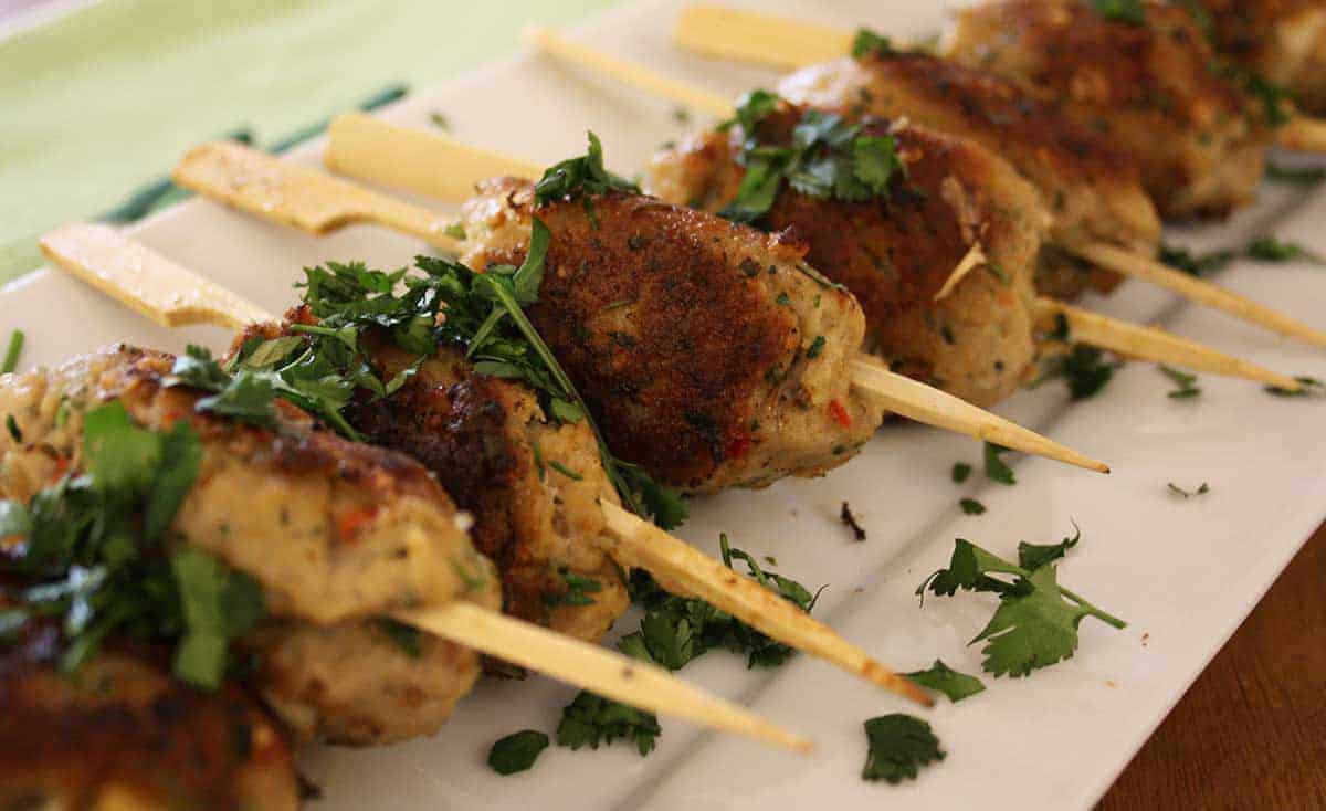 Pork koftas on a plate.