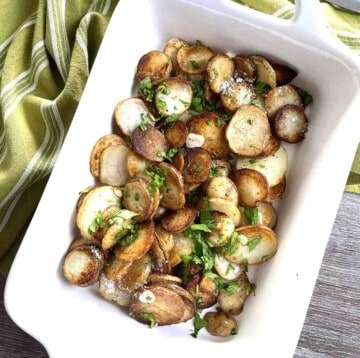 Sarladaise Potatoes in a white dish.
