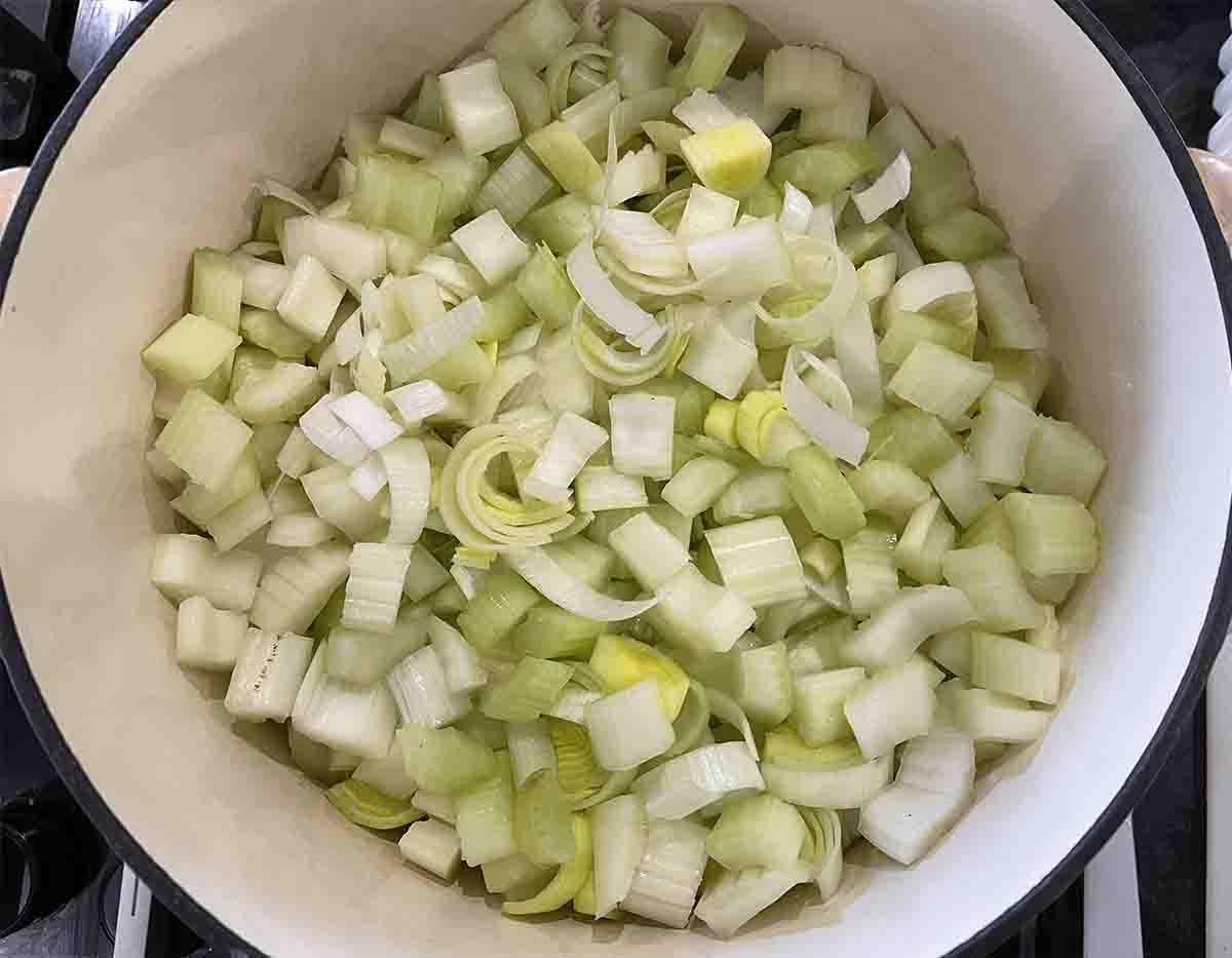 leeks and celery in a saucepan.