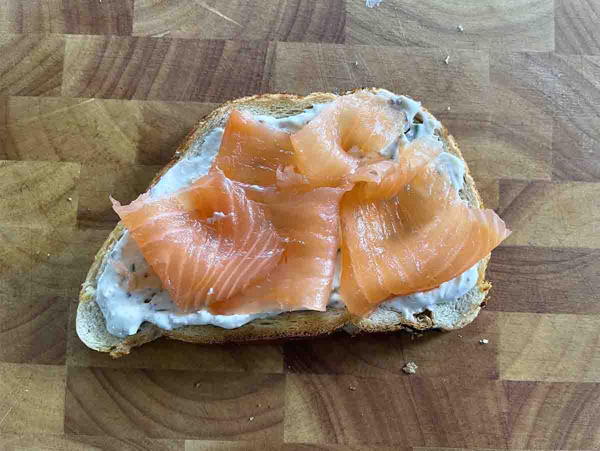 salmon on top of the toast.
