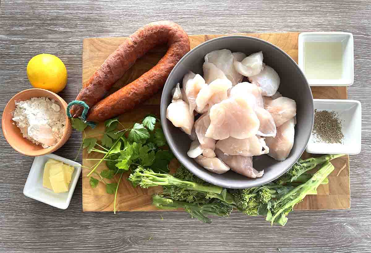 ingredients including cod cheeks, chorizo, broccoli, lemon, parsley.