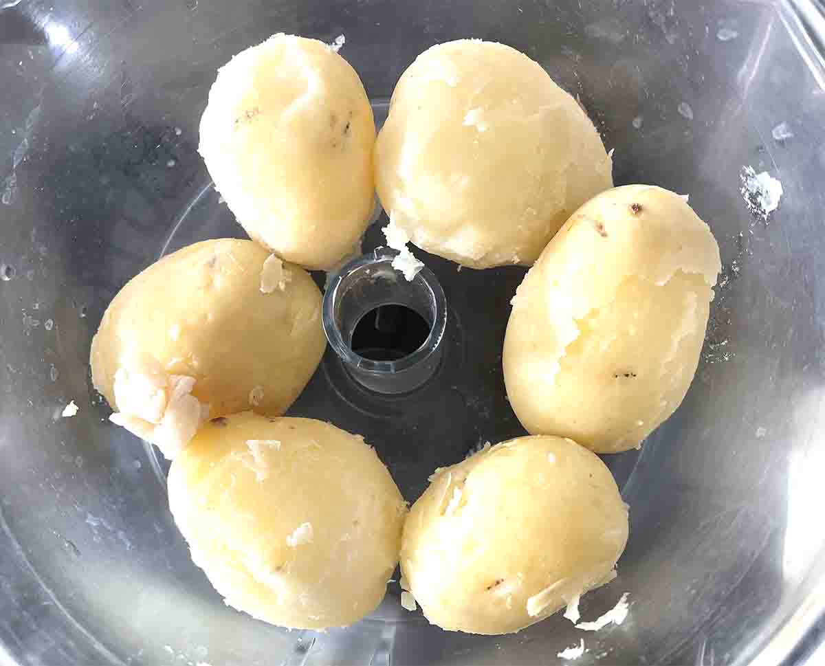 peeled potatoes in a food processor.