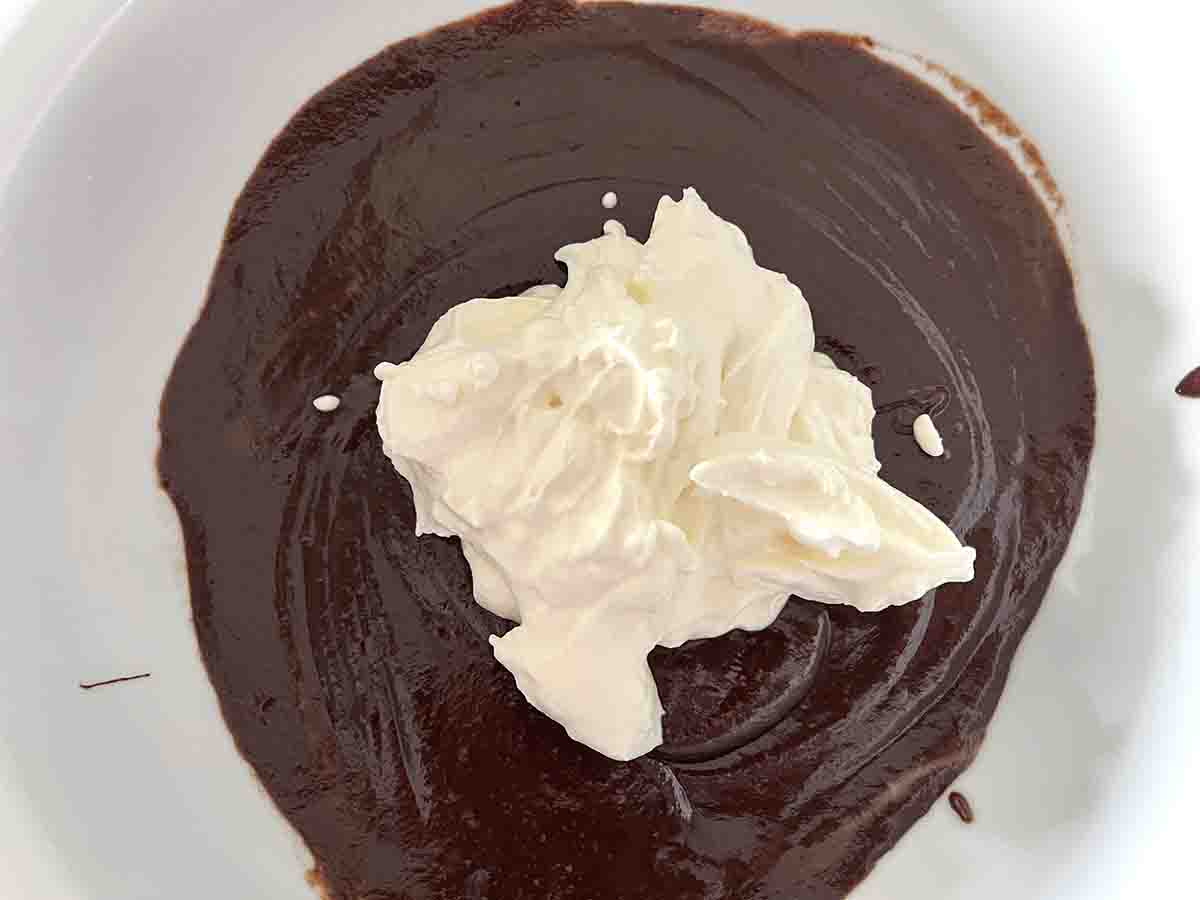cream added to chocolate mixture.
