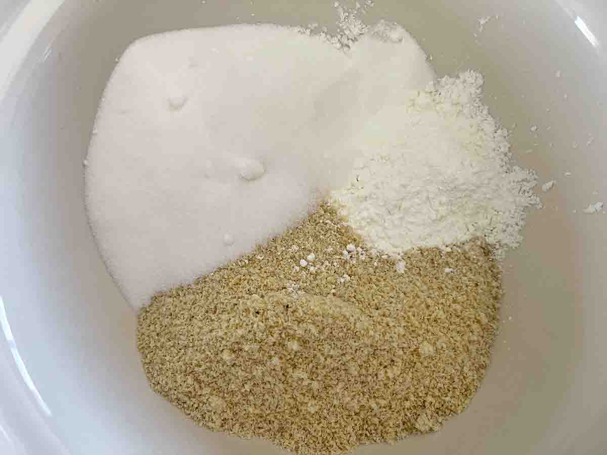 sugar, flour  and almonds in a bowl.