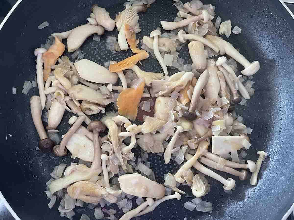 mushrooms added to pan.
