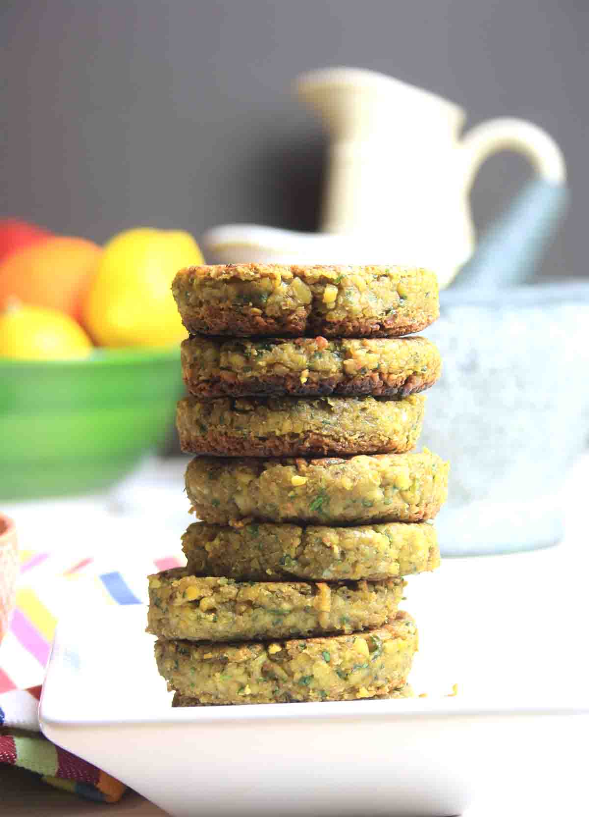 stack of vegan chickpea burgers.