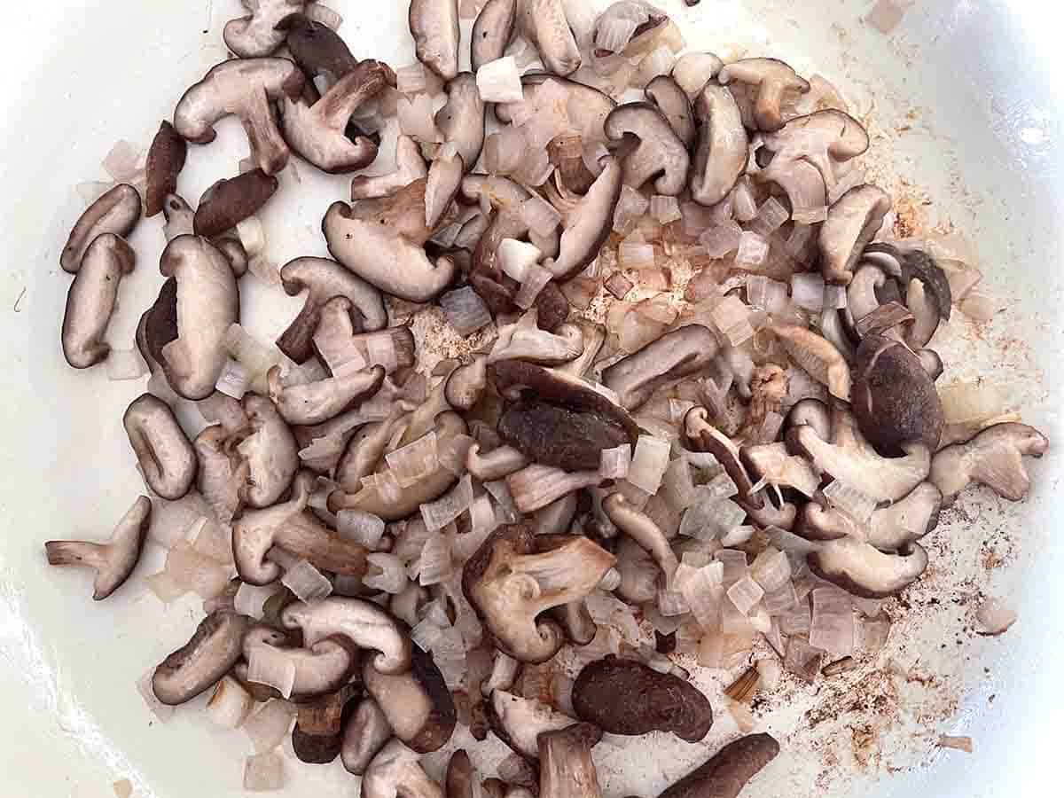 mushrooms added to the pan.