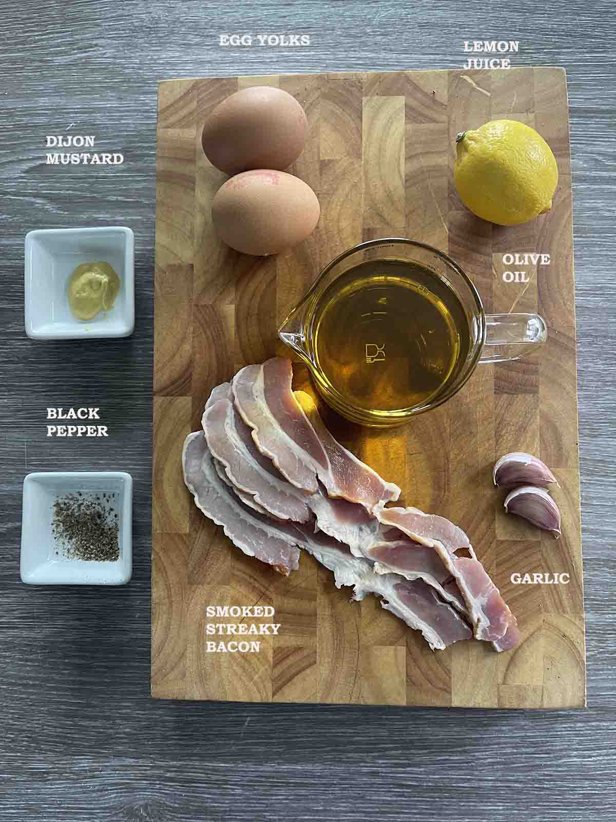 ingredients including bacon, garlic, oil and eggs.