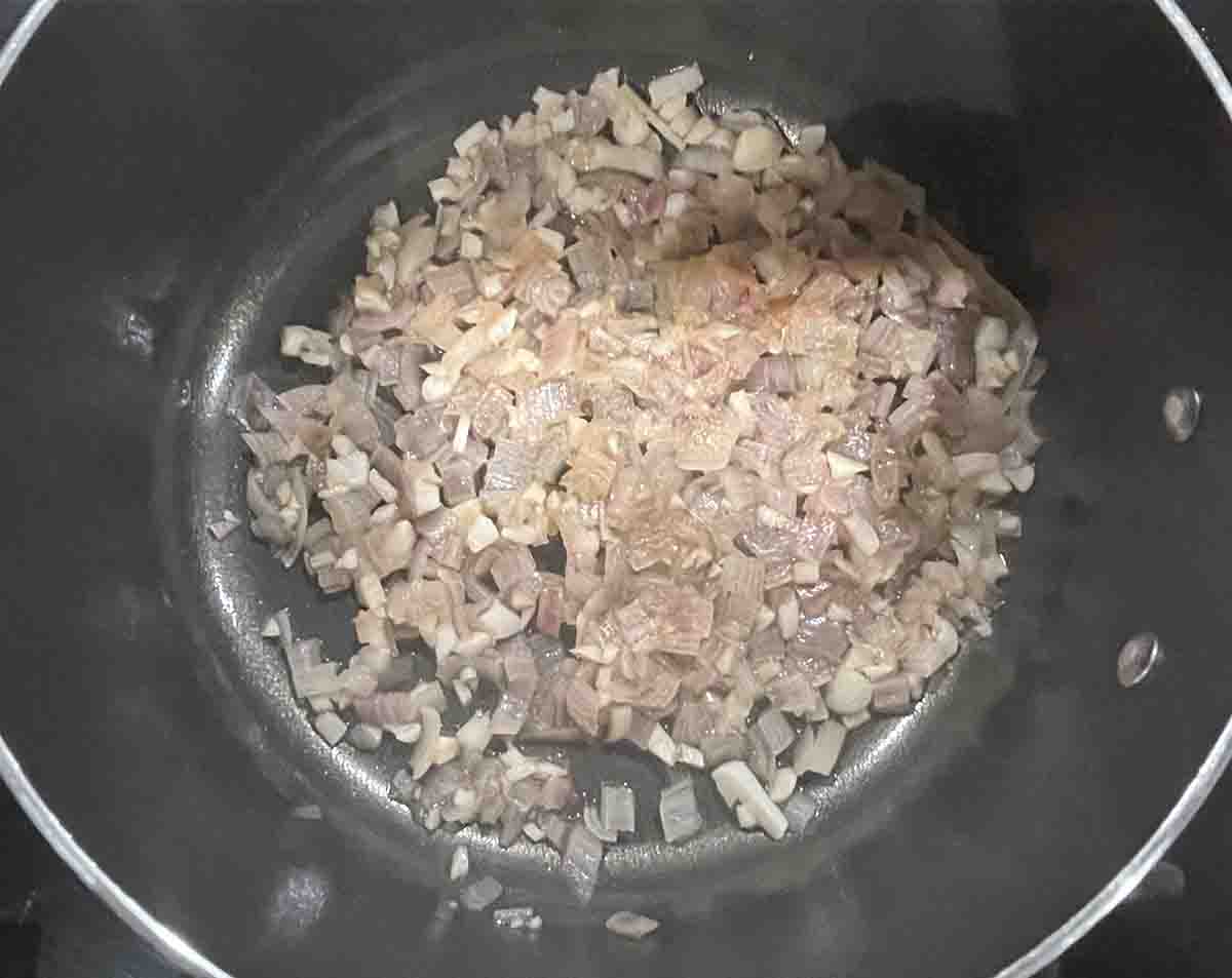shallots reduction in a pan.