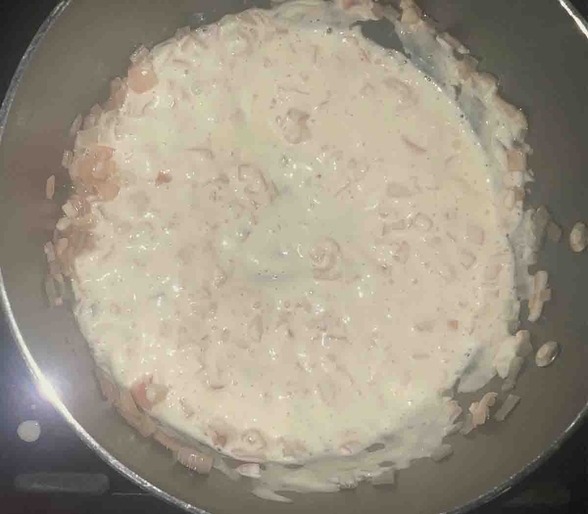 cream added to saucepan.