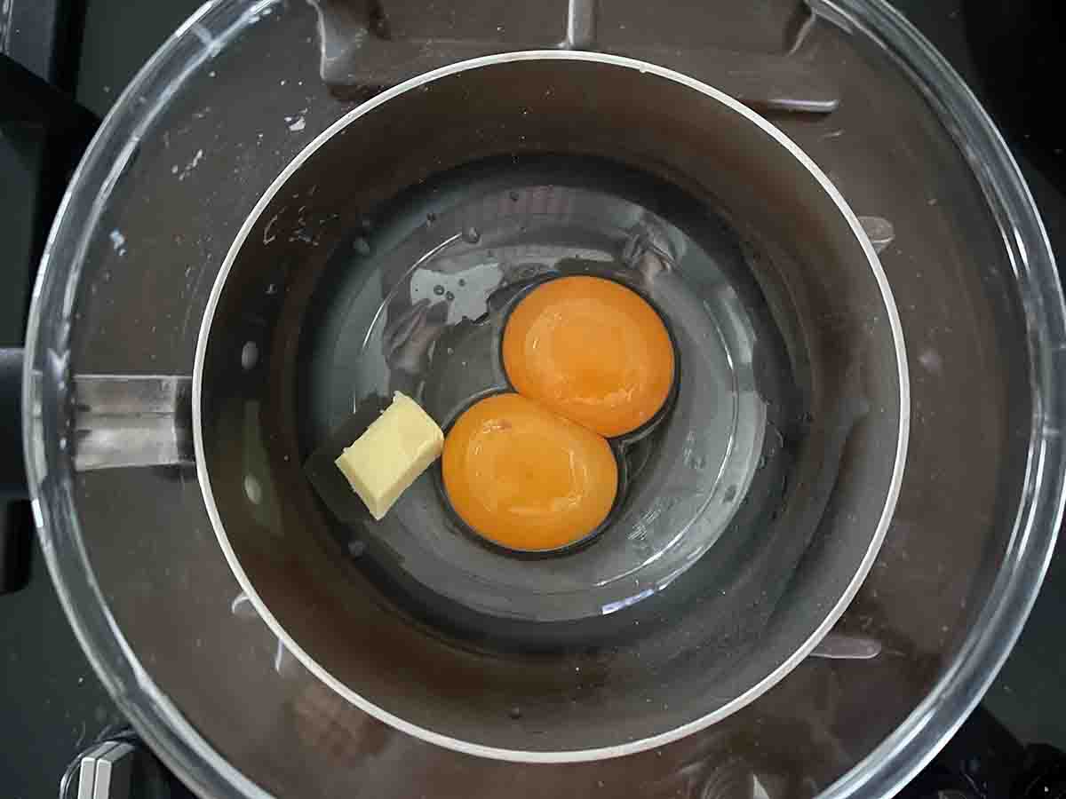 egg yolks and butter in a bowl.