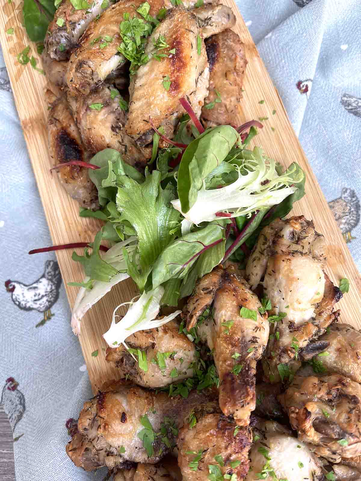 grilled chicken wings on a plate.