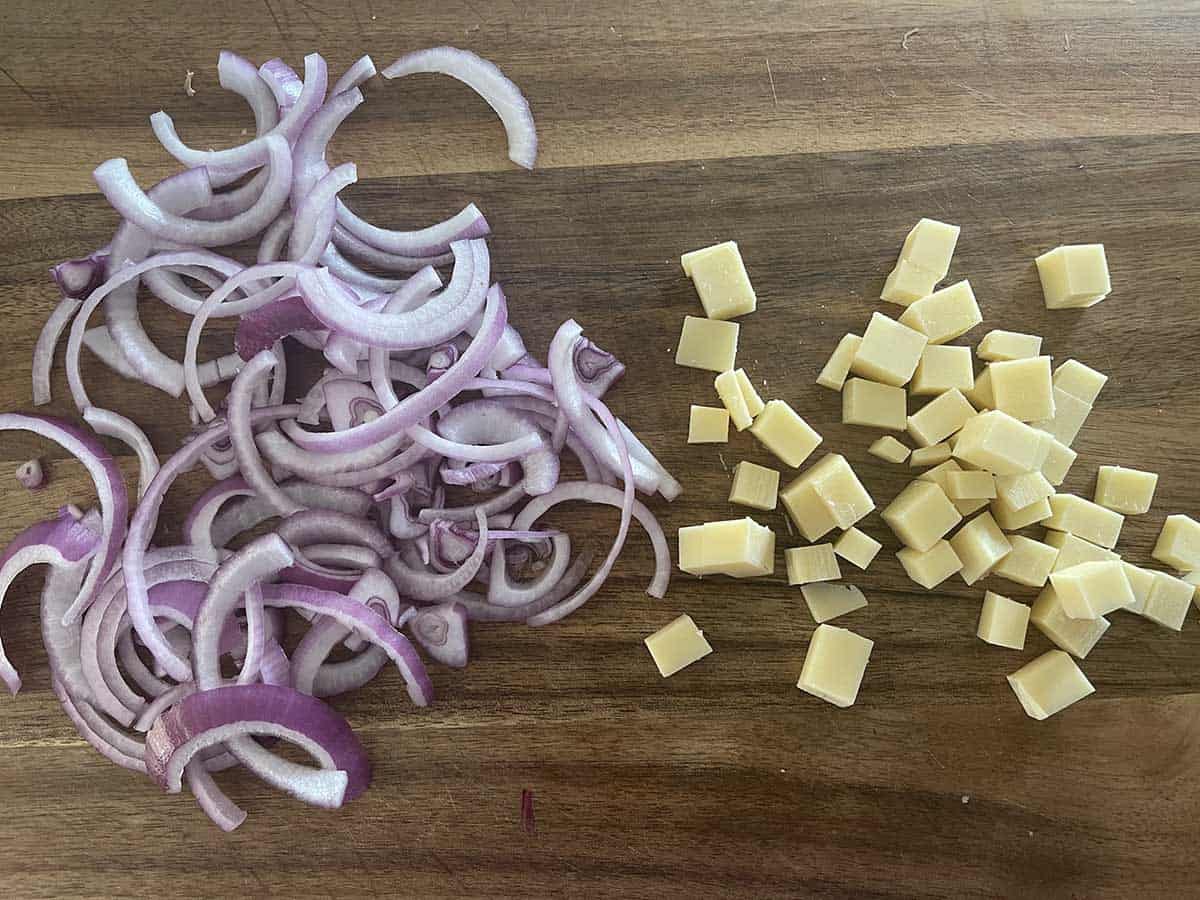 cubed cheese and sliced onion.