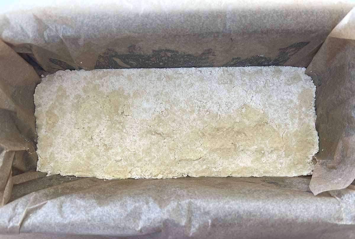 lined loaf tin with shortbread base.