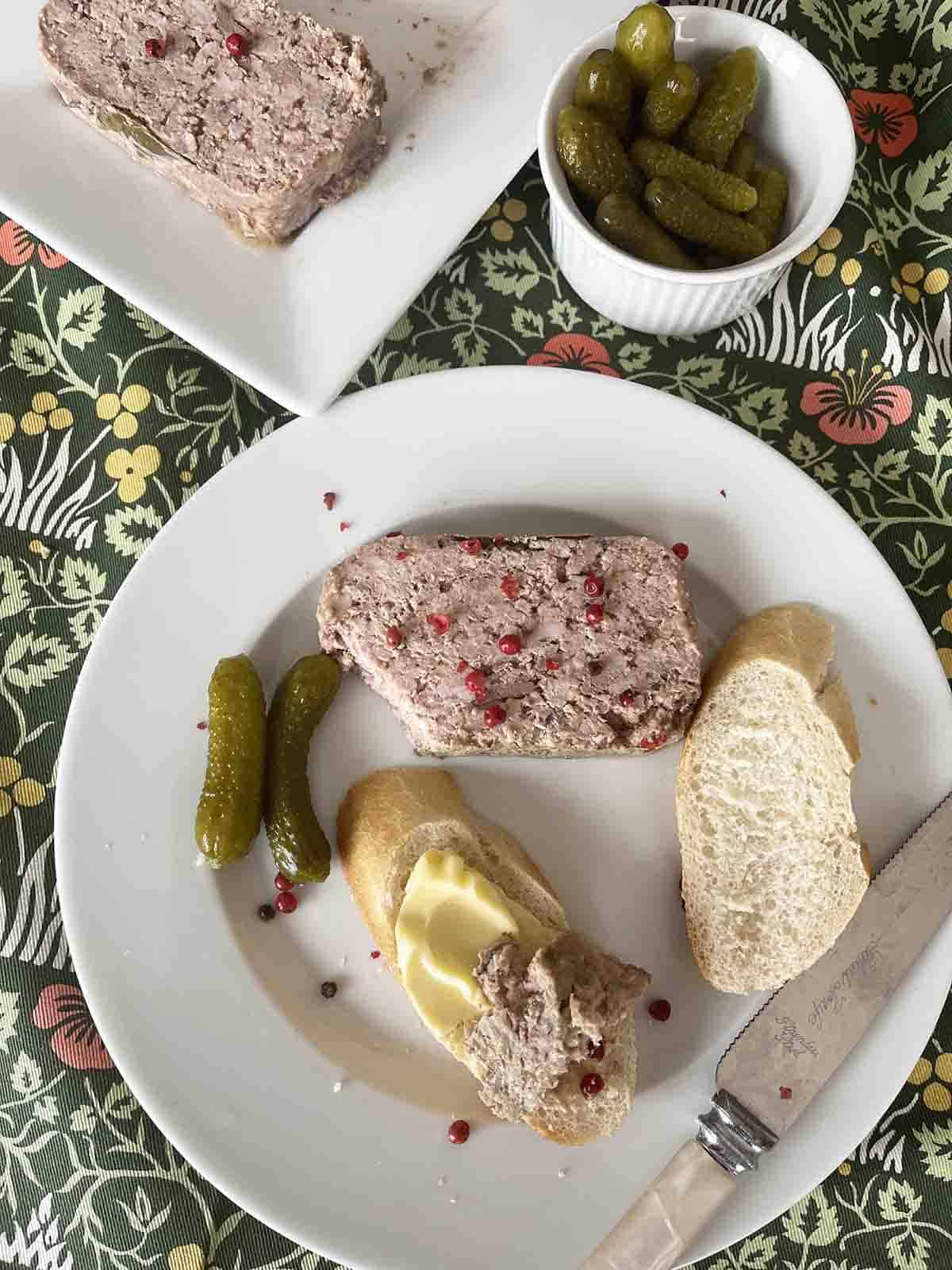 slice of pâté with crusty bread and butter.