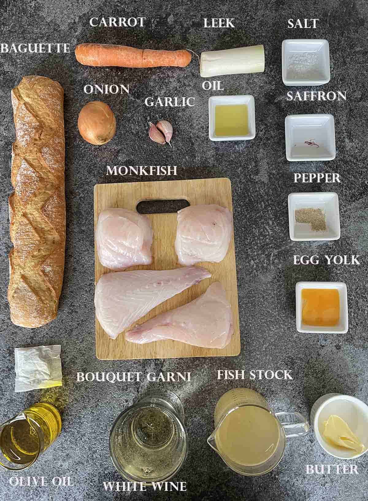 ingredients including monkfish, vegetables and stock.