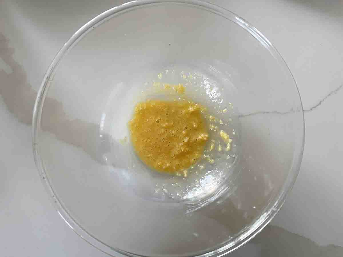 garlic and egg in a bowl.