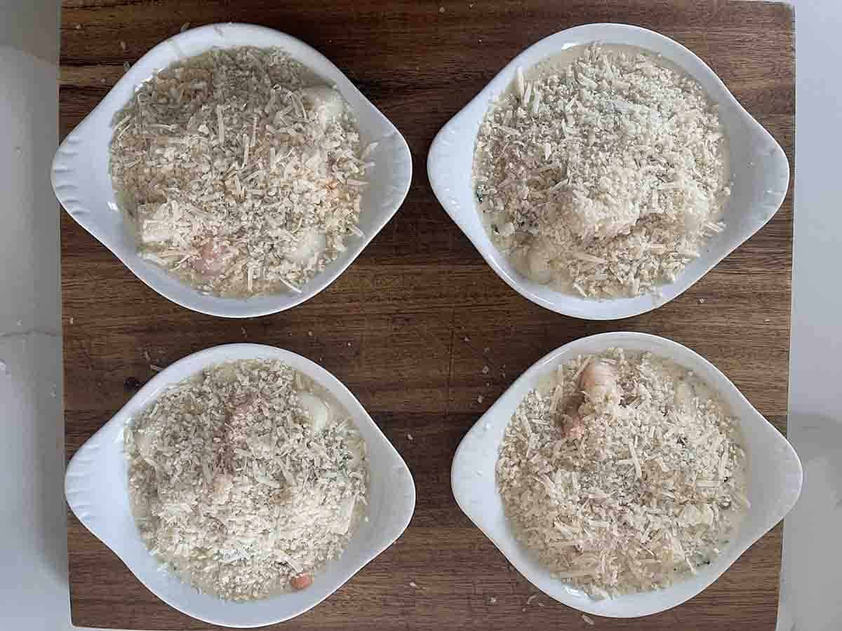 cheese and breadcrumbs added to the dishes.