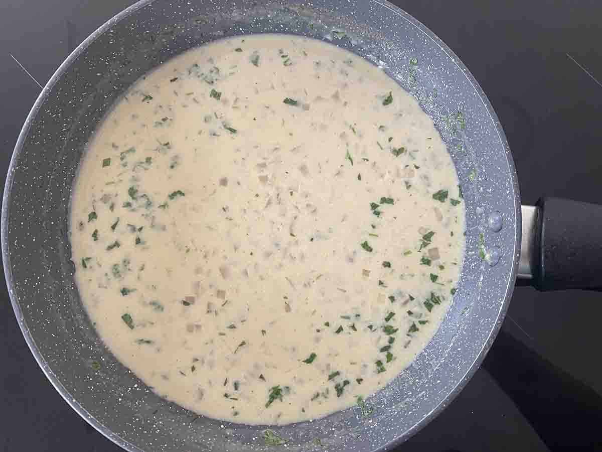 cream and parsley added to the pan.