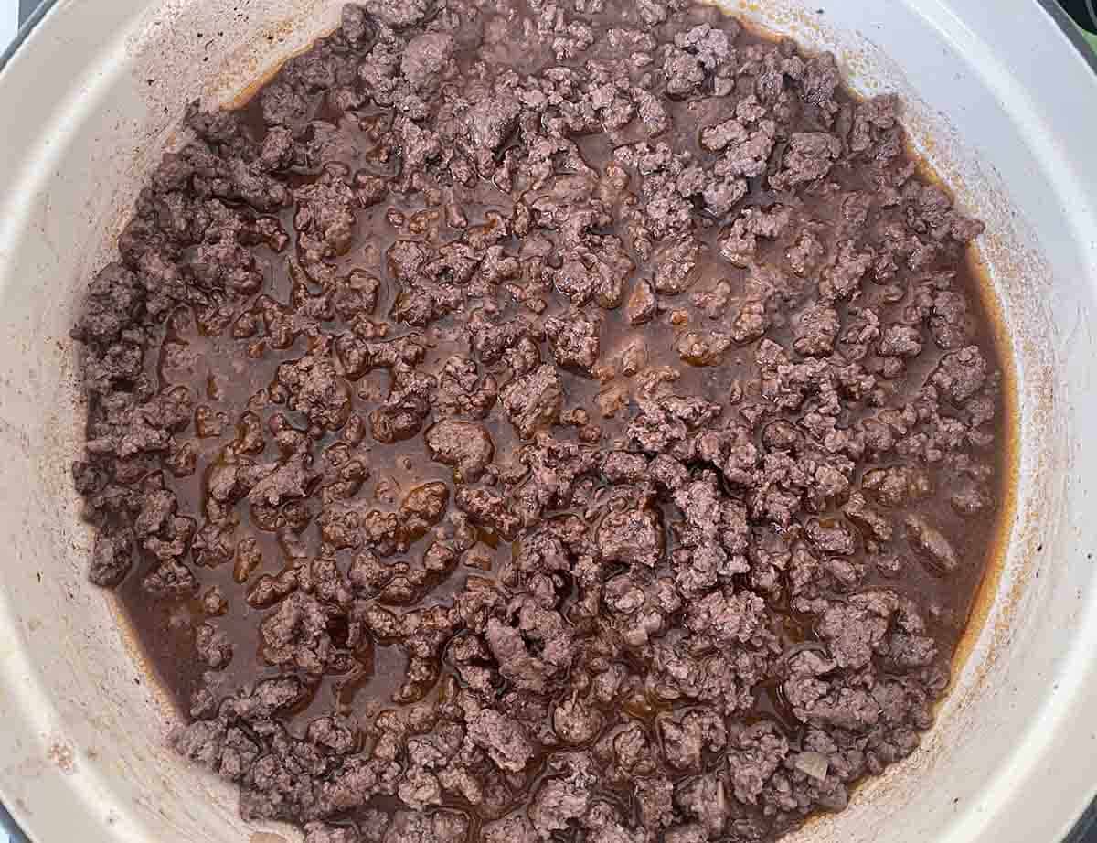 stock and wine added to mince.