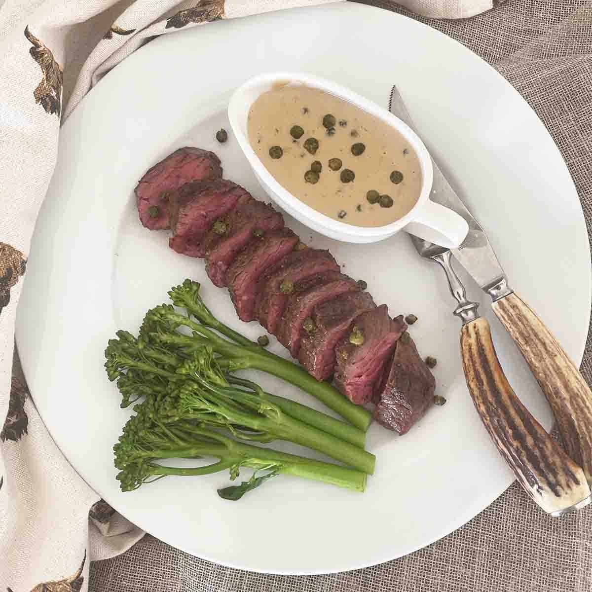onglet with green peppercorn sauce.