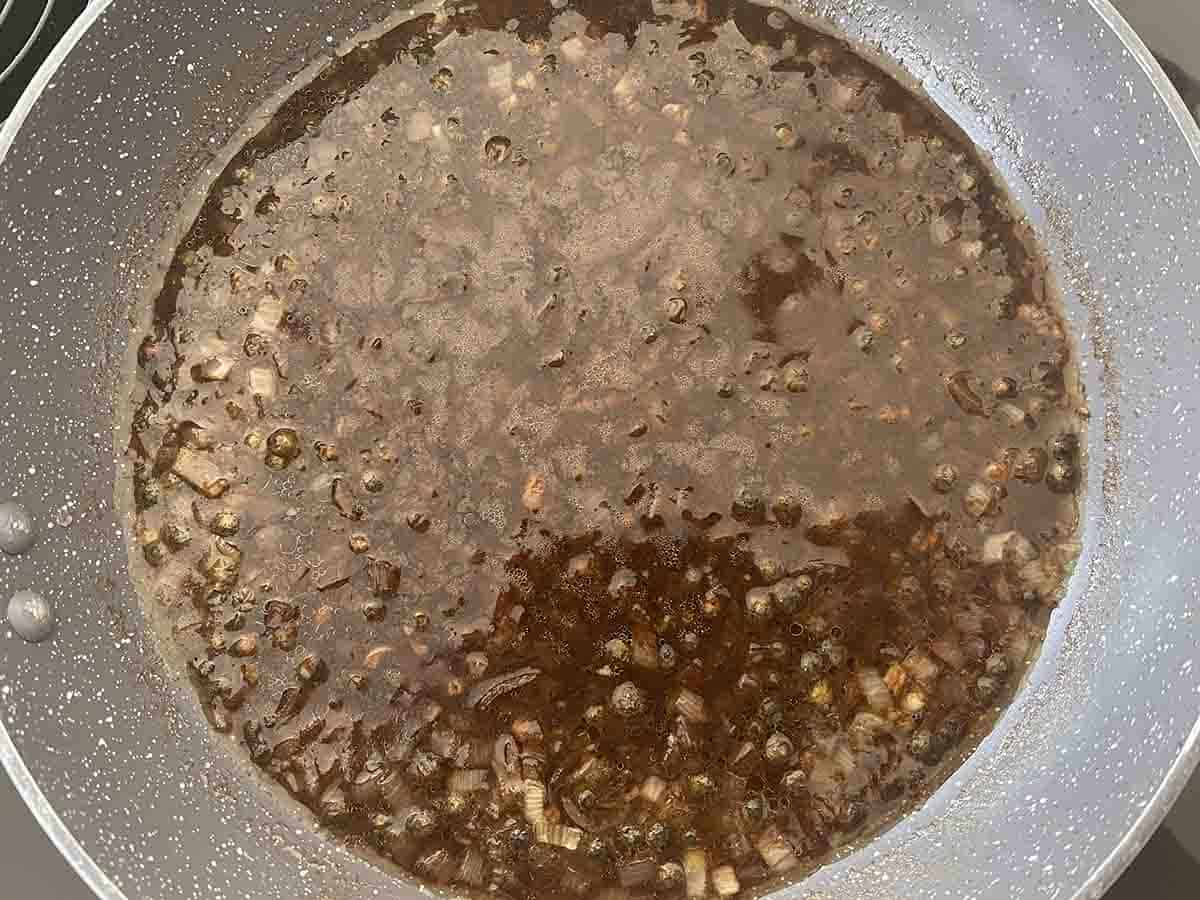 stock added to sauce.